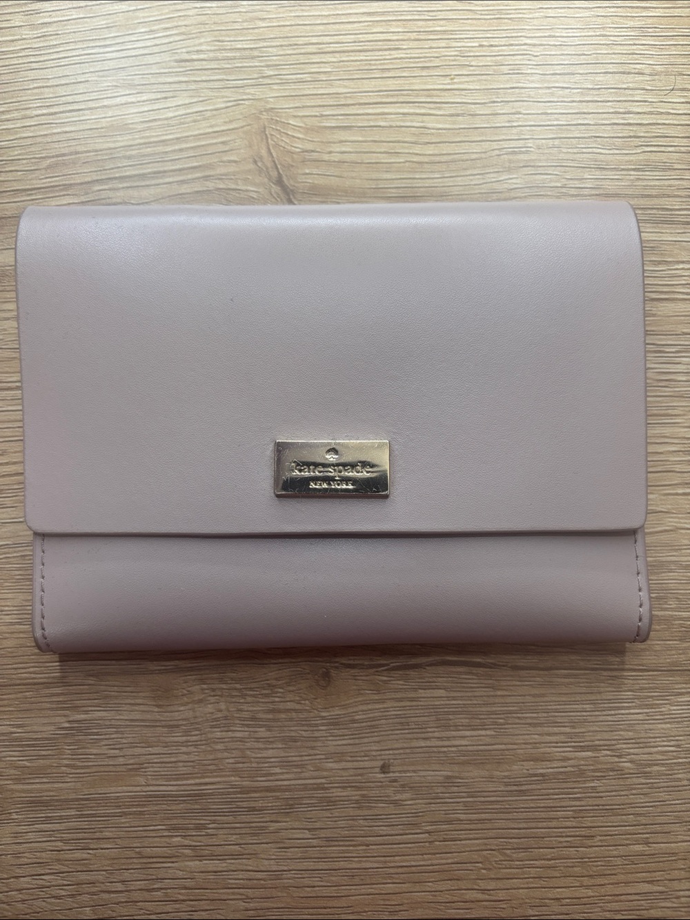 kate spade pale blush leather flap wallet with gold plate